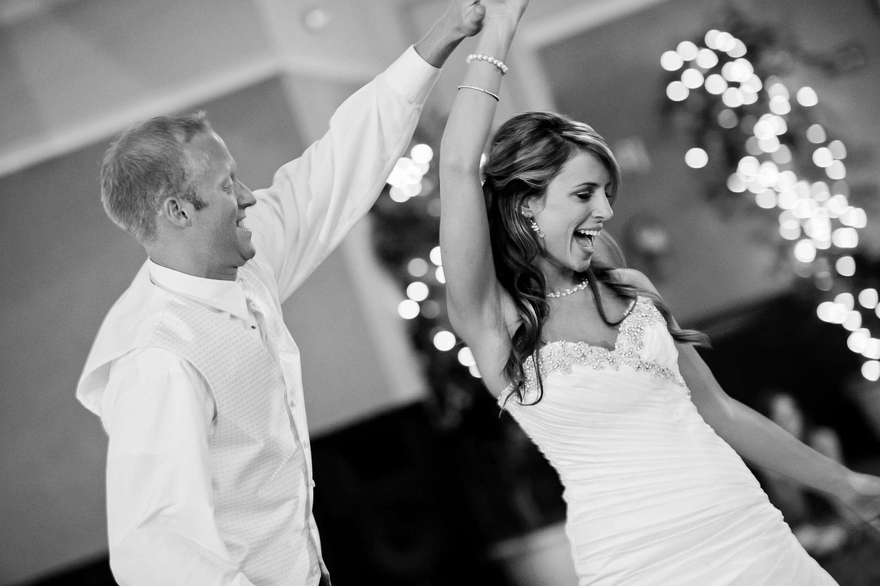 Bride and groom dancing at wedding