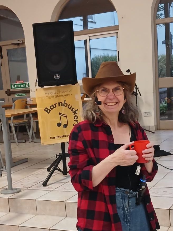 Judy Mapledoram calling country dances at Sidcot School Reunion